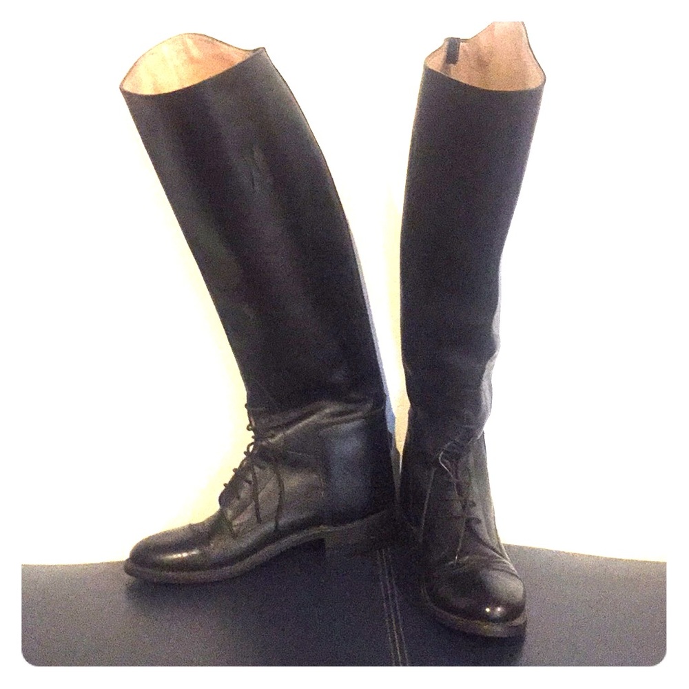 Black, equestrian style riding boots.